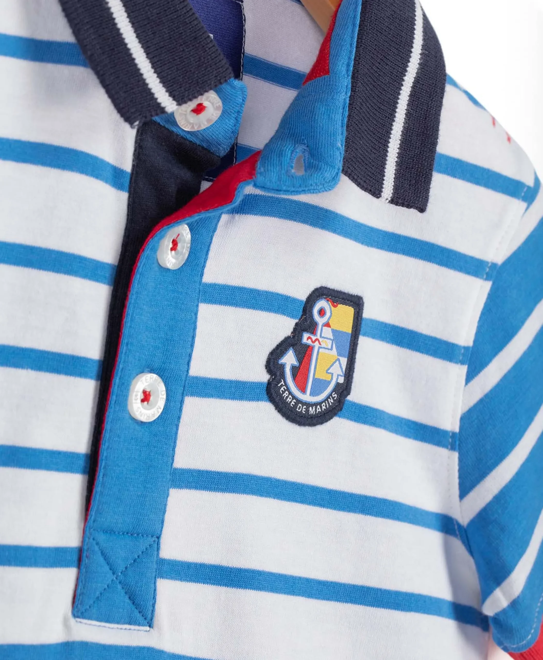 POLO MC FOND BLANC RAYE BLEU CIRAYE